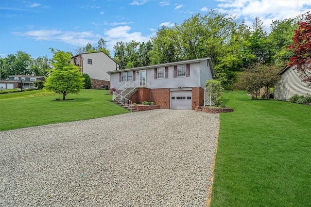 ranch-style home featuring driveway, an attached garage, brick siding, a front lawn, and stairs
