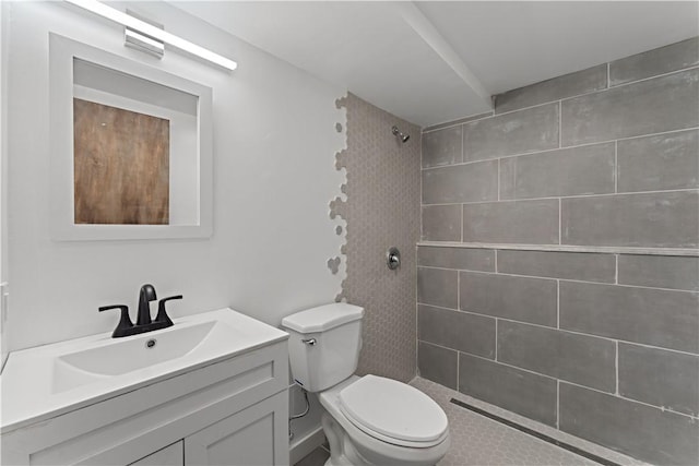 23 Saint Thomas St, South Side, PA 15203 - full bath featuring a tile shower, vanity, and toilet