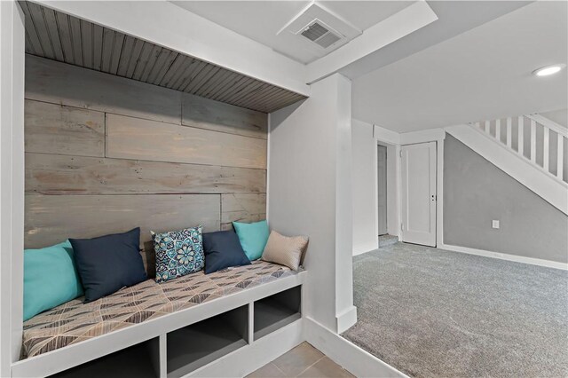 23 Saint Thomas St, South Side, PA 15203 - mudroom featuring wood walls, baseboards, carpet, and tile patterned floors
