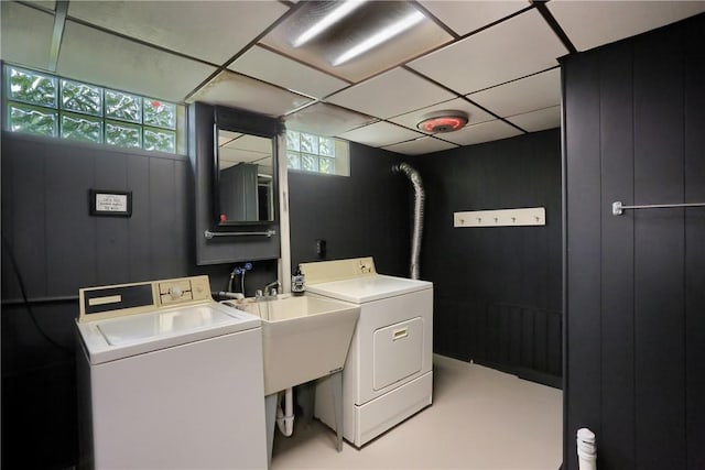 clothes washing area with washer and dryer