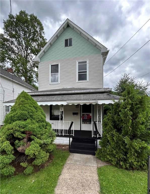 402 Vine St, South Connellsville, PA 15425 - american foursquare style home with covered porch