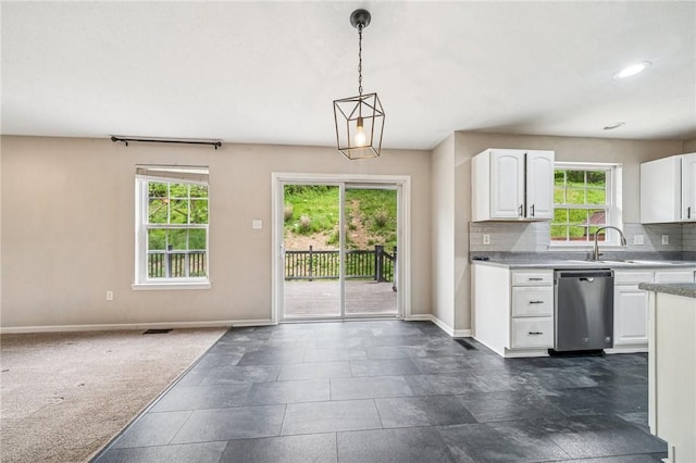 2034 Meadowridge Dr, North Strabane, PA 15301 - kitchen featuring dishwasher, baseboards, white cabinets, and pendant lighting