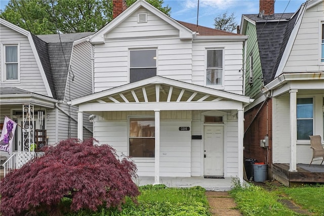 3316 Alberta St, Munhall, PA 15120 - colonial inspired home with a chimney, a gambrel roof, a shingled roof, and a porch