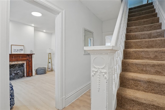 3316 Alberta St, Munhall, PA 15120 - stairs with wood finished floors and a fireplace with flush hearth