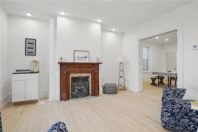 3316 Alberta St, Munhall, PA 15120 - living area featuring wood finished floors, a fireplace, recessed lighting, and baseboards