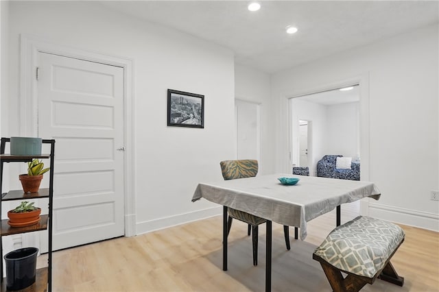 3316 Alberta St, Munhall, PA 15120 - dining space with baseboards, light wood-style floors, and recessed lighting