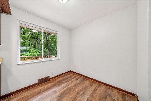 161 Reaghard Dr, West Deer, PA 15024 - unfurnished room with baseboards and wood finished floors