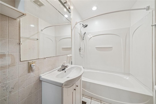 161 Reaghard Dr, West Deer, PA 15024 - bathroom featuring  shower combination, vanity, and tile patterned floors
