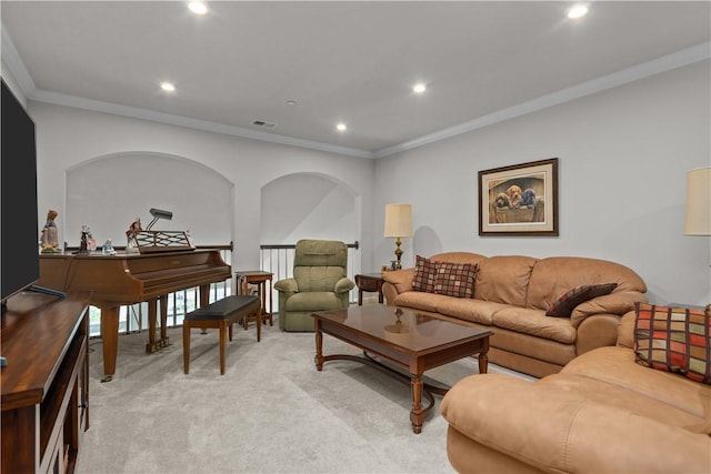 living area featuring light colored carpet, recessed lighting, and crown molding