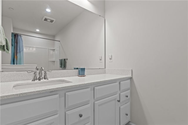 bathroom with vanity, recessed lighting, and a shower with shower curtain