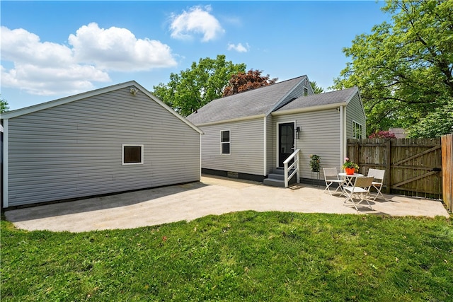 1702 Carlisle St, New Castle/2Nd, PA 16105 - rear view of house with a patio, entry steps, and a gate