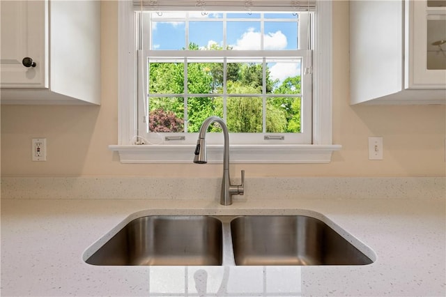 815 Kira Cir, Cranberry Twp, PA 16066 - kitchen view of a sink, white cabinets, and light stone countertops