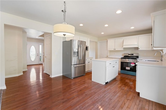 815 Kira Cir, Cranberry Twp, PA 16066 - kitchen with appliances with stainless steel finishes, a sink, dark wood-style floors, light countertops, and white cabinetry