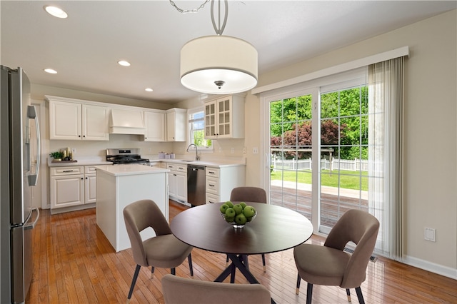 815 Kira Cir, Cranberry Twp, PA 16066 - kitchen with appliances with stainless steel finishes, light wood-style floors, light countertops, white cabinetry, and recessed lighting