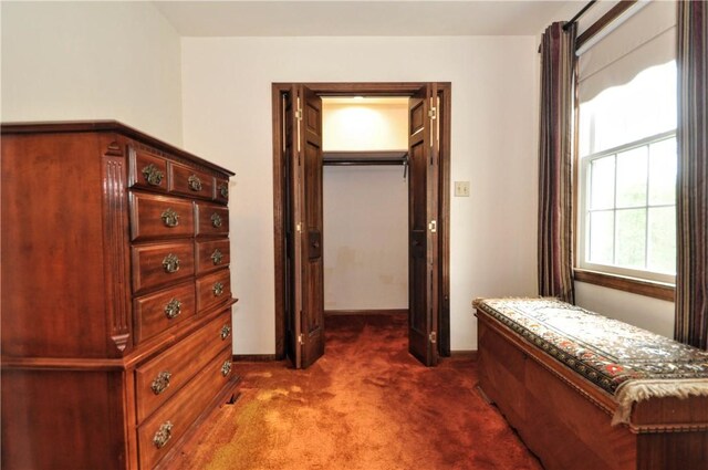 24 N St, Smith, PA 15004 - bedroom with dark colored carpet, baseboards, and a walk in closet