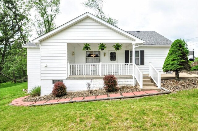 24 N St, Smith, PA 15004 - view of front of house with a porch, a front yard, and a shingled roof