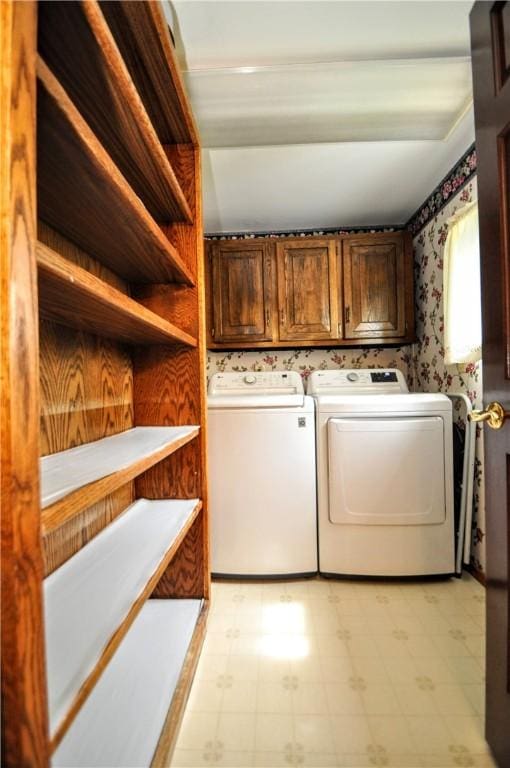 24 N St, Smith, PA 15004 - clothes washing area with light flooring, wallpapered walls, cabinet space, and washing machine and clothes dryer