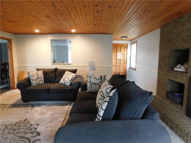living room featuring a fireplace and wooden ceiling