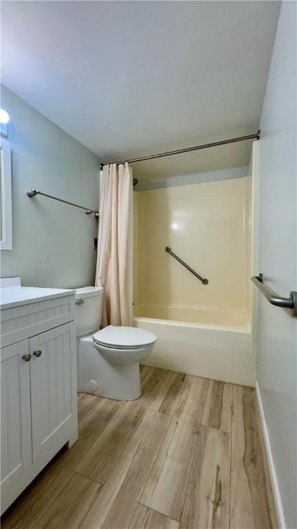 1987 Centurion Dr Unit 107, Forest Hills Boro, PA 15221 - bathroom featuring wood finished floors, toilet, shower / bathtub combination with curtain, and vanity