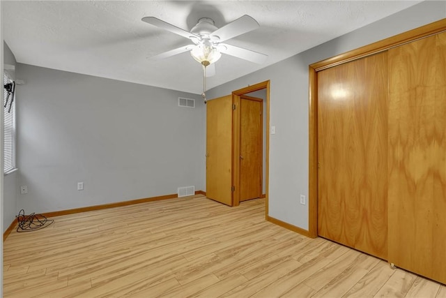 907 3rd St, Baden, PA 15005 - unfurnished bedroom featuring light wood-type flooring, a closet, baseboards, and a ceiling fan
