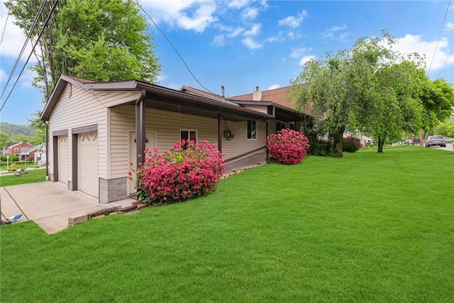 907 3rd St, Baden, PA 15005 - view of side of home featuring a yard and concrete driveway