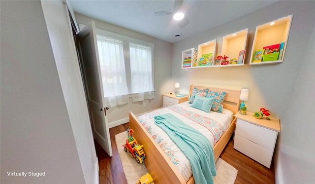912 N Saint Clair St, Highland Park, PA 15206 - bedroom with wood finished floors, a ceiling fan, and baseboards