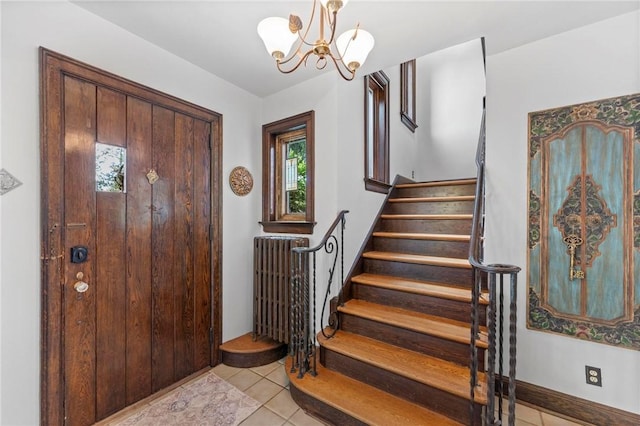 218 Barth Ave, Mt Lebanon, PA 15228 - entrance foyer featuring stairway, a chandelier, light tile patterned floors, and radiator