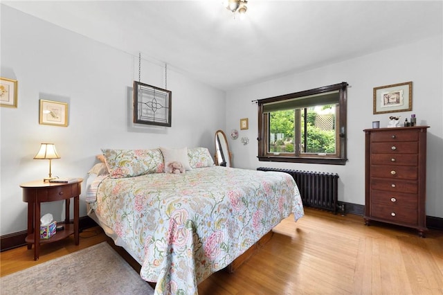 218 Barth Ave, Mt Lebanon, PA 15228 - bedroom featuring radiator and wood finished floors