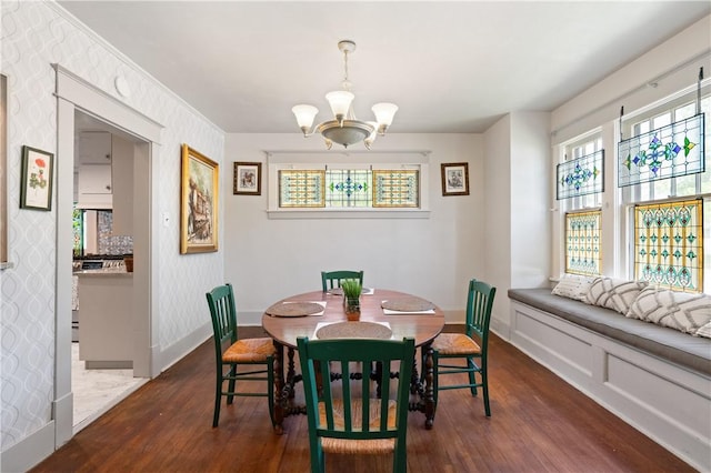 800 4th St, Beaver, PA 15009 - dining space featuring dark wood-style flooring, a chandelier, and baseboards