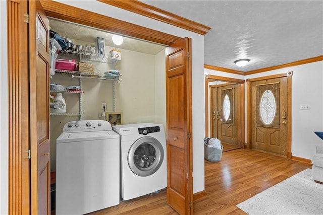 1265 Norberry Ct Unit 18, Cranberry Twp, PA 16066 - washroom featuring washing machine and dryer, crown molding, wood finished floors, and baseboards