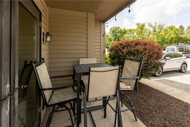 1265 Norberry Ct Unit 18, Cranberry Twp, PA 16066 - balcony featuring outdoor dining space and a patio