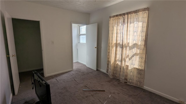 315 Lowell St, East Liberty, PA 15206 - carpeted spare room featuring baseboards and a textured ceiling