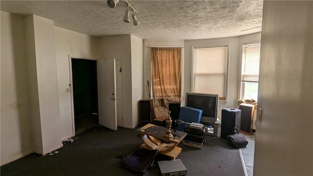315 Lowell St, East Liberty, PA 15206 - misc room featuring a desk, a textured ceiling, and baseboards