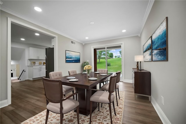 44 Heritage Hills Rd, South Union Twp, PA 15401 - dining space with dark wood finished floors, recessed lighting, crown molding, baseboards, and a fireplace