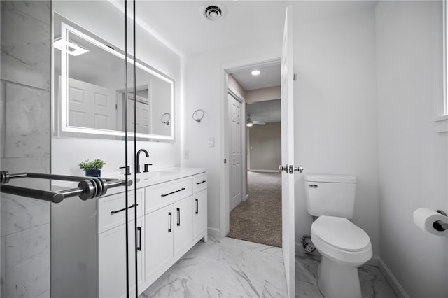 44 Heritage Hills Rd, South Union Twp, PA 15401 - bathroom featuring toilet, baseboards, marble finish flooring, and vanity