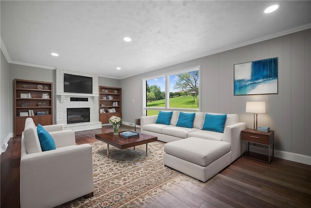 44 Heritage Hills Rd, South Union Twp, PA 15401 - living room featuring baseboards, wood finished floors, a brick fireplace, crown molding, and recessed lighting