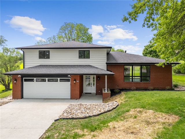 44 Heritage Hills Rd, South Union Twp, PA 15401 - split level home featuring an attached garage, a front yard, concrete driveway, brick siding, and roof with shingles