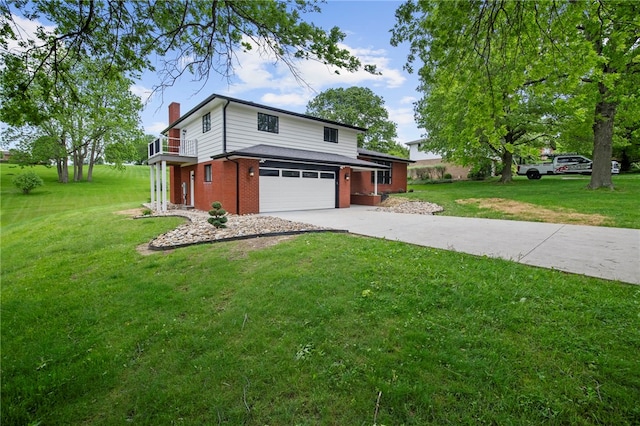 44 Heritage Hills Rd, South Union Twp, PA 15401 - view of front facade with a chimney, driveway, a garage, and a front lawn