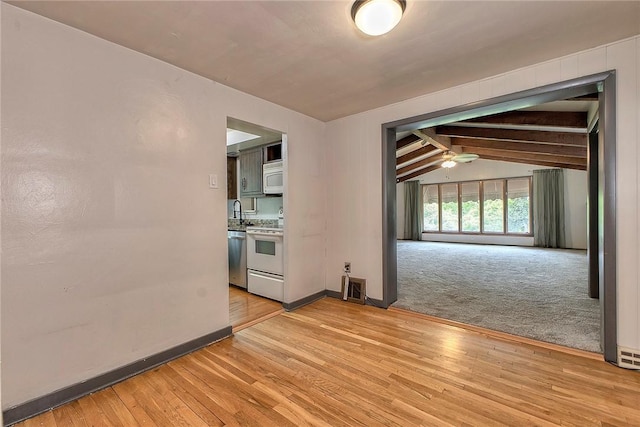 9 Forest Ave, City Of Greensburg, PA 15601 - unfurnished room featuring light wood-type flooring, baseboards, a ceiling fan, and a sink