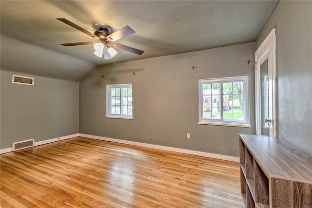 9 Forest Ave, City Of Greensburg, PA 15601 - empty room with light wood finished floors, ceiling fan, baseboards, and lofted ceiling