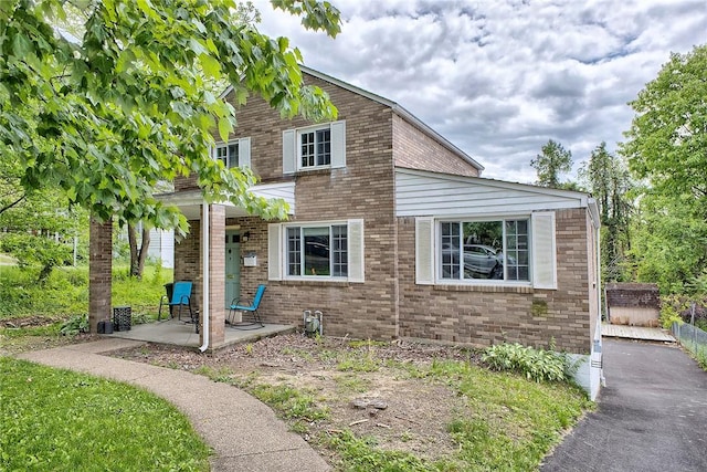 9 Forest Ave, City Of Greensburg, PA 15601 - view of front facade with brick siding and a patio area