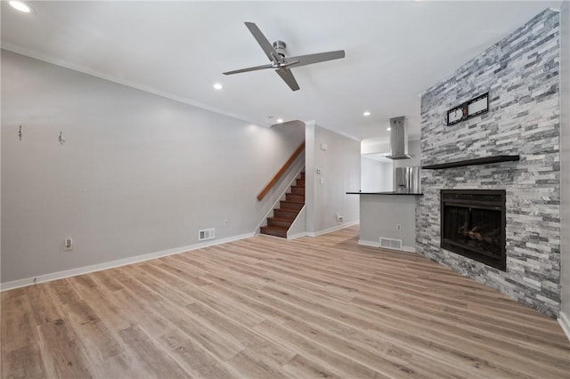 715 Filbert St, Shadyside, PA 15232 - unfurnished living room with a ceiling fan, baseboards, light wood-type flooring, recessed lighting, and stairway