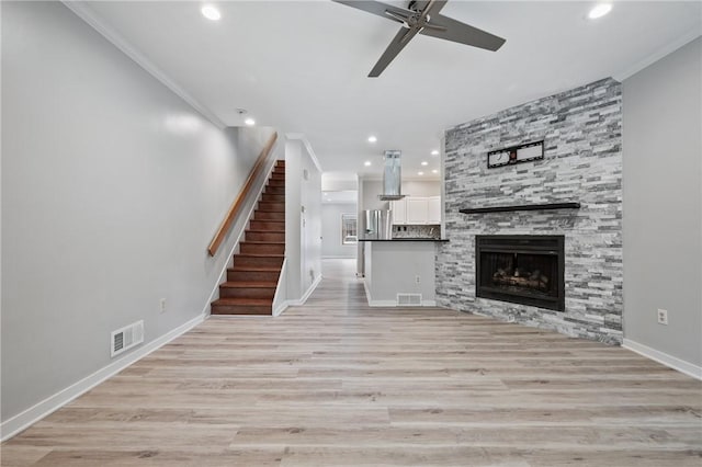 715 Filbert St, Shadyside, PA 15232 - unfurnished living room with recessed lighting, a ceiling fan, light wood-style flooring, baseboards, and stairs