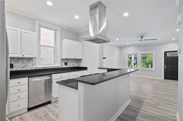715 Filbert St, Shadyside, PA 15232 - kitchen with range hood, stainless steel appliances, light wood-type flooring, tasteful backsplash, and white cabinets
