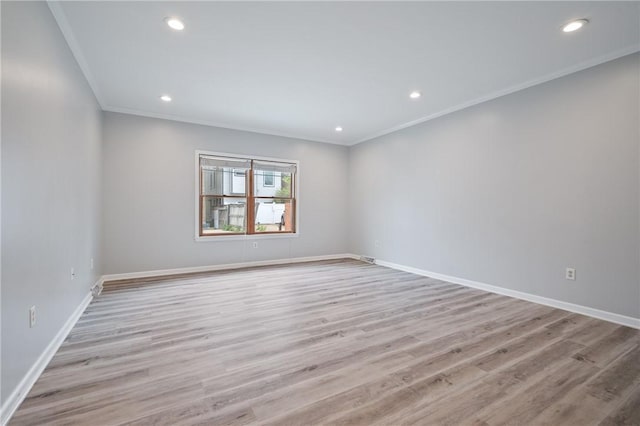 715 Filbert St, Shadyside, PA 15232 - empty room featuring ornamental molding, light wood-style flooring, baseboards, and recessed lighting
