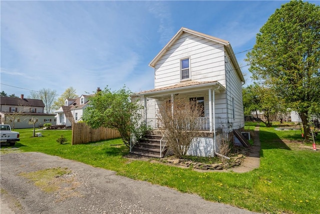 106 Level St, Bentleyville, PA 15314 - view of front facade with a front lawn, stairway, and a porch