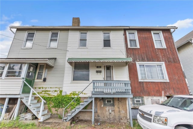 1630 Poplar Way, Braddock, PA 15104 - townhome / multi-family property featuring stairway and a chimney