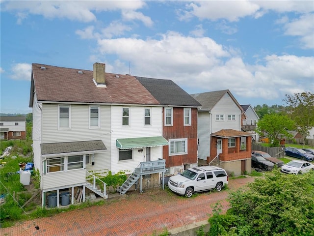 1630 Poplar Way, Braddock, PA 15104 - rear view of house featuring a chimney and stairs