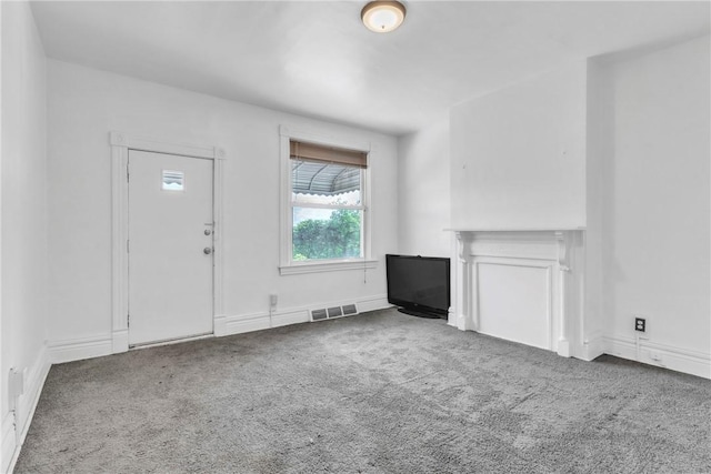 1630 Poplar Way, Braddock, PA 15104 - unfurnished living room featuring carpet floors and baseboards