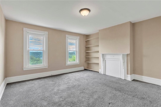 1630 Poplar Way, Braddock, PA 15104 - unfurnished living room featuring carpet floors and baseboards